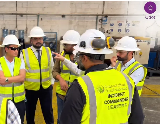Qdot consultants during a safety briefing at a Saudi NAPESCO site visit in Saudi Arabia