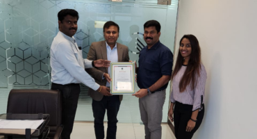 CEO Elma Electromechanical with team after successfully achieving ISO certificate at Dubai Office